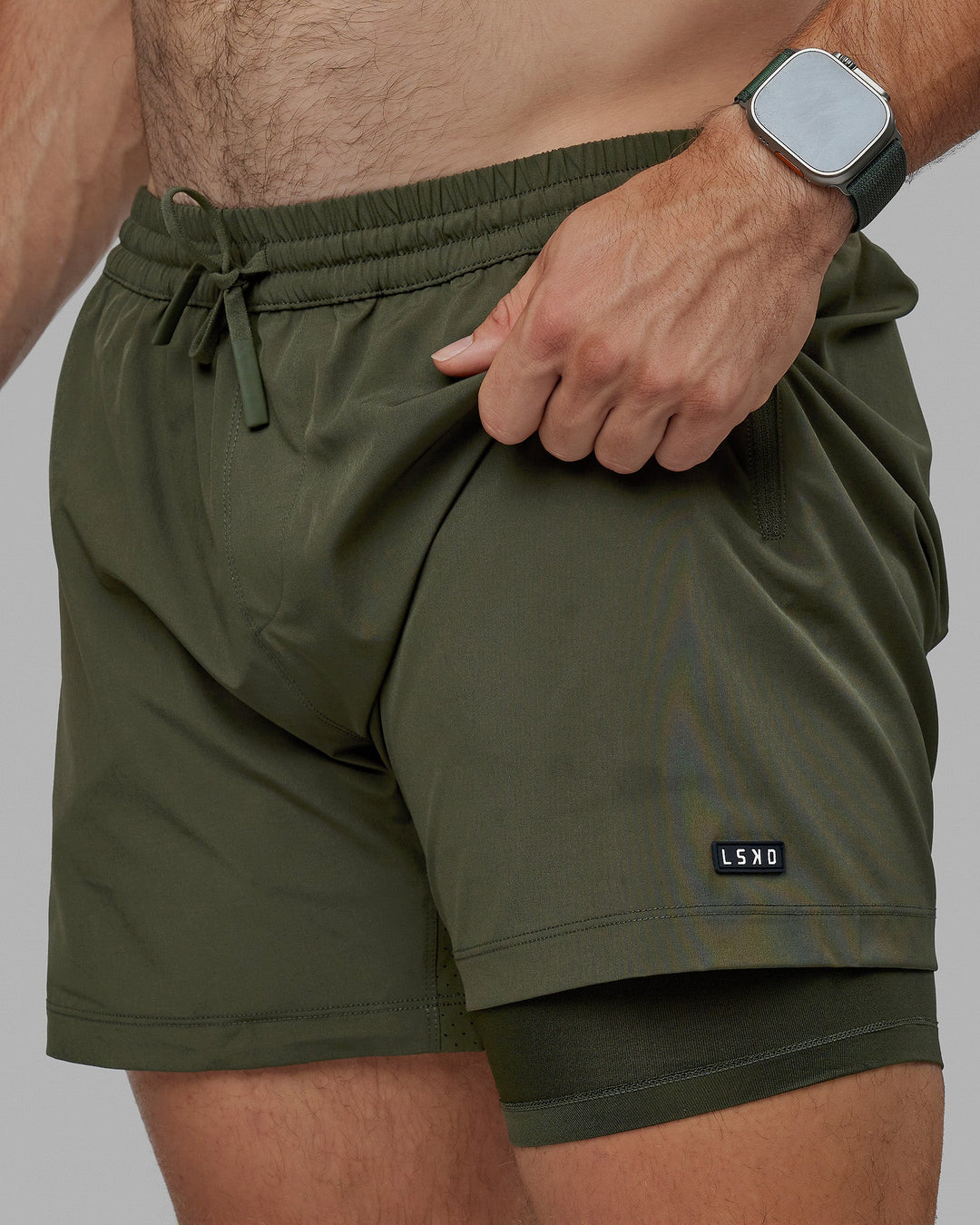 Man wearing Rep 5" Lined Performance Short - Forest Night