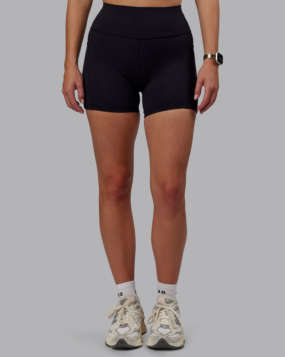 Woman wearing Rep Ultra High-Rise 4" Short Pockets - Black-Black