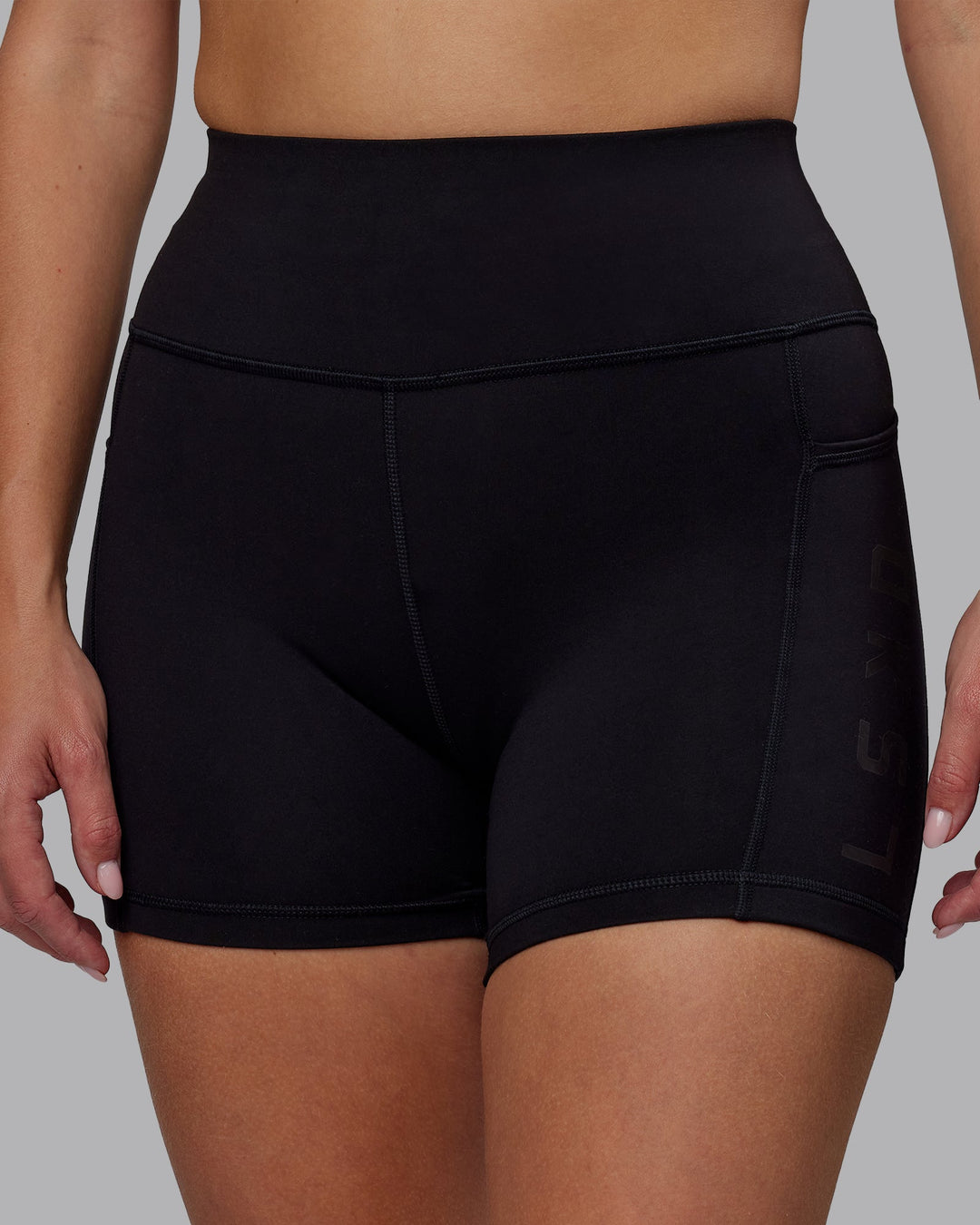Woman wearing Rep Ultra High-Rise 4" Short Pockets - Black-Black