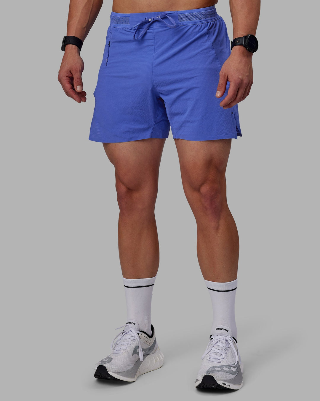 Man wearing UltraAir 5" Lined Performance Shorts - Baja Blue-Reflective