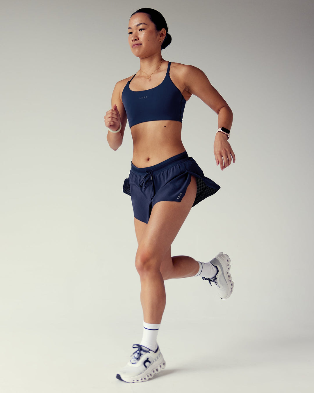 Woman wearing Accelerate 3" Running Short - Future Navy | Size:S
