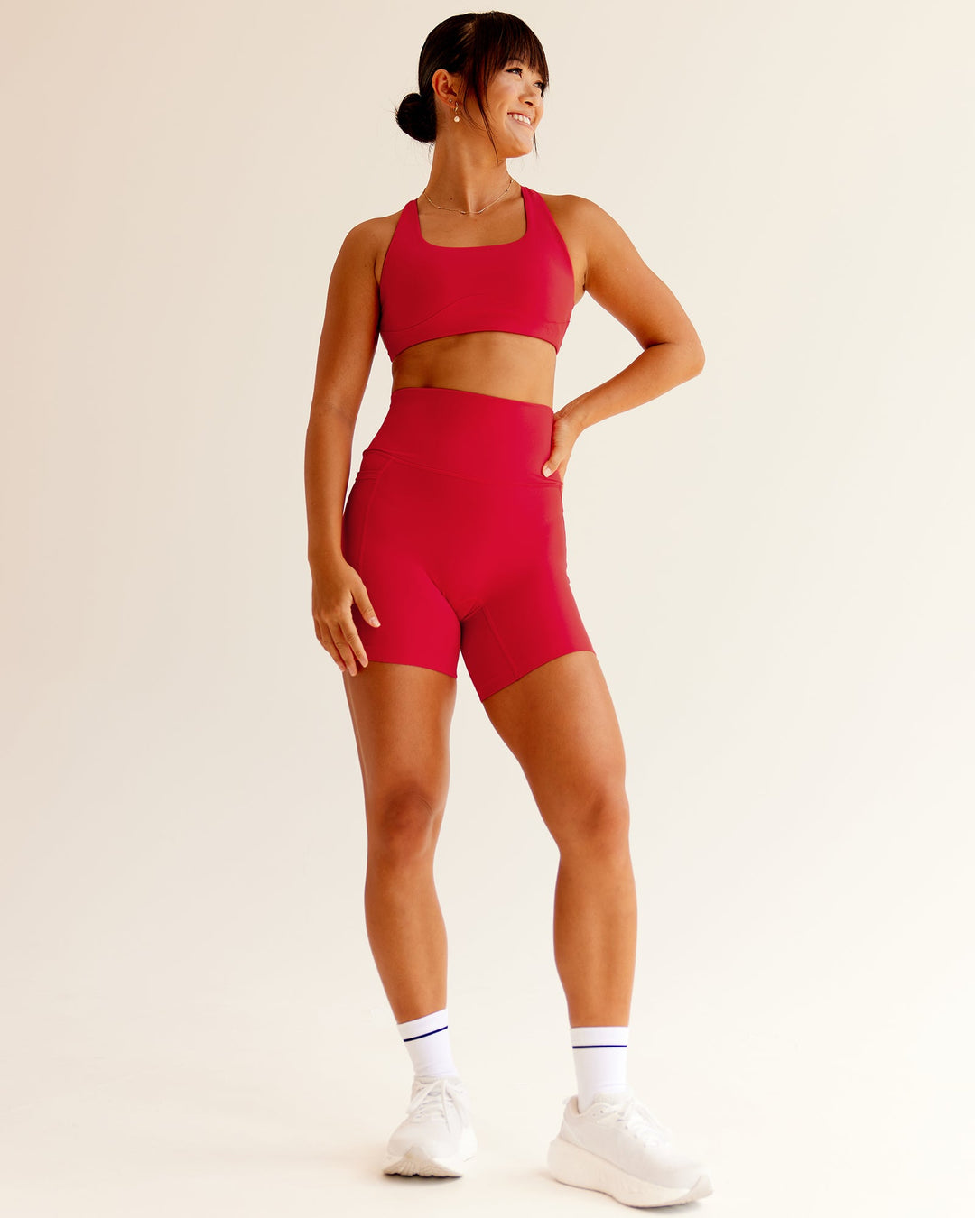 Woman wearing Elixir Ultra High-Rise 6" Short Pockets in Flame | Size:S