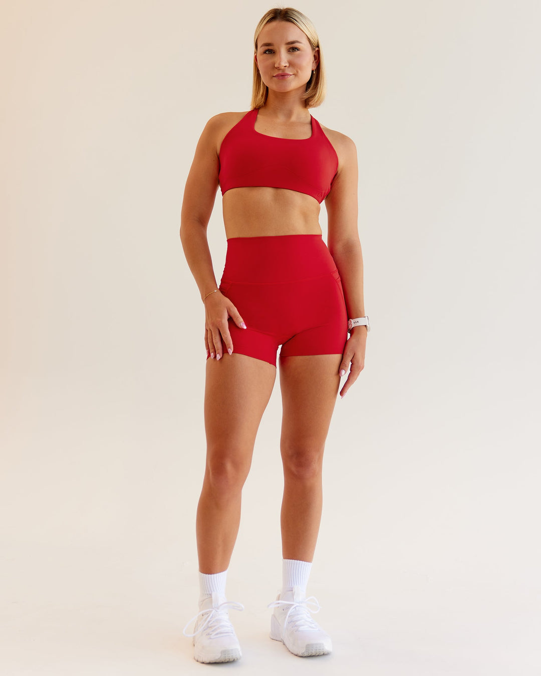 Woman wearing Elixir Ultra High-Rise 4" Short Pockets in Flame | Size:S
