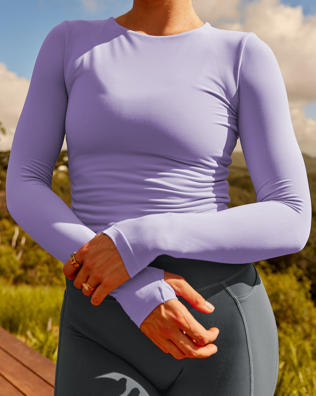 Woman wearing Staple Long Sleeve Cropped Tee in Violet Ray | Size:S