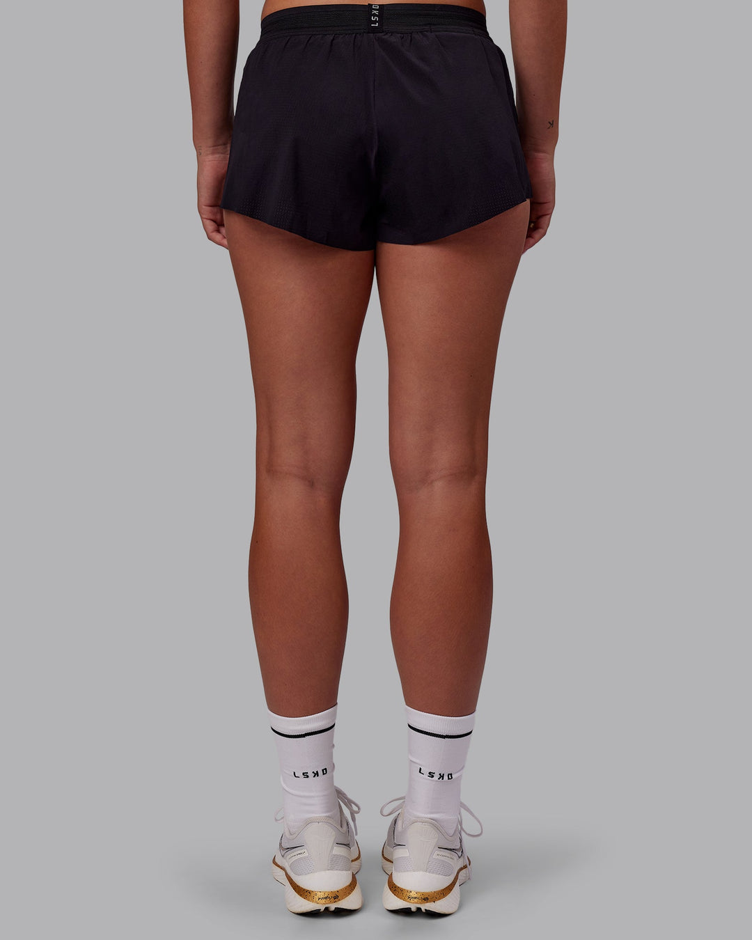 Woman wearing Accelerate 3" Running Short - Black | Model:Charlize | Size:S