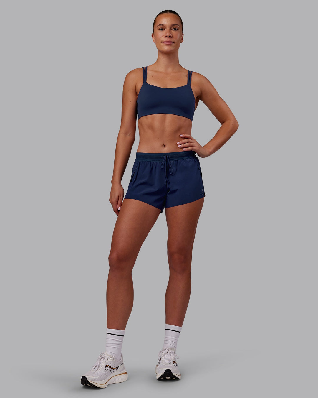Woman wearing Accelerate 3" Running Short - Future Navy | Model:Charlize | Size:S