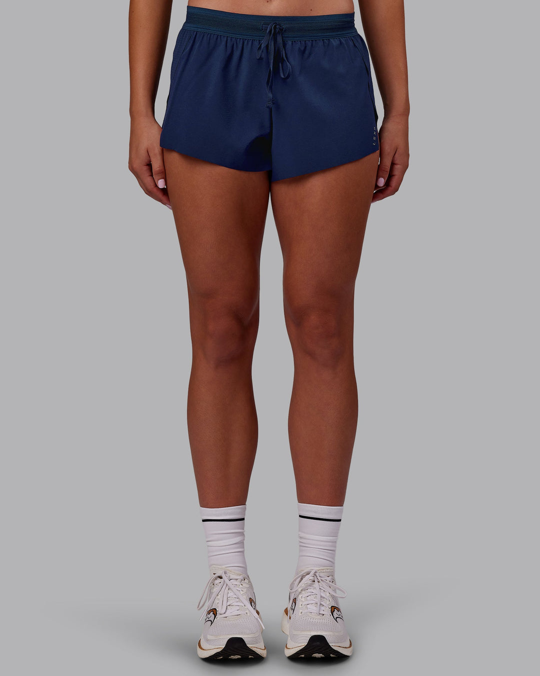 Woman wearing Accelerate 3" Running Short - Future Navy | Model:Charlize | Size:S