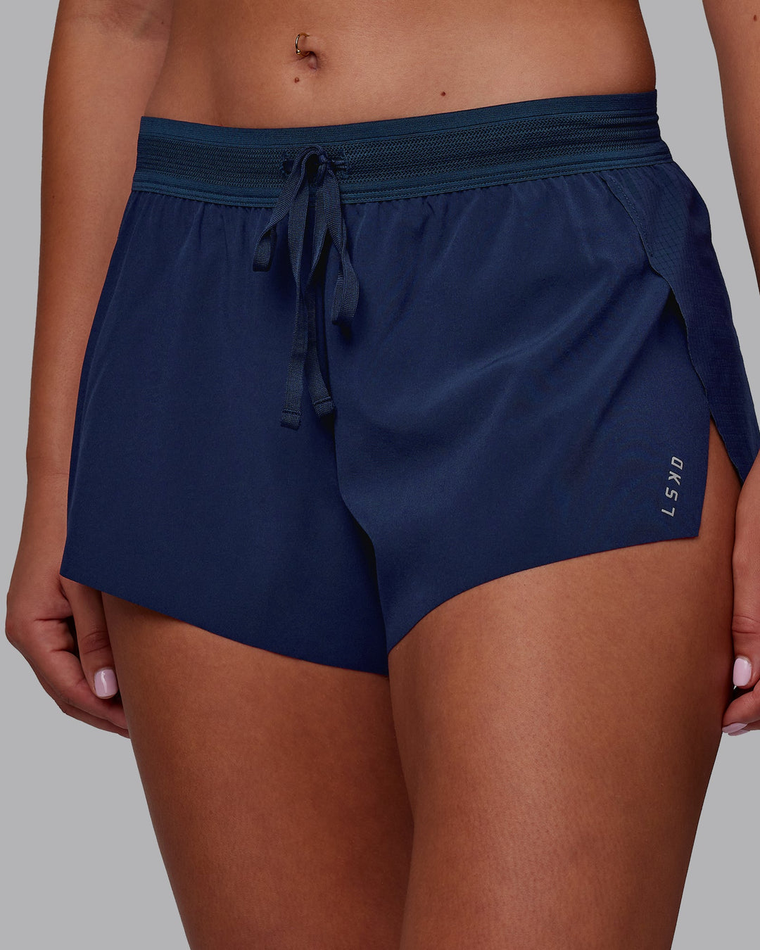 Woman wearing Accelerate 3" Running Short - Future Navy | Model:Charlize | Size:S