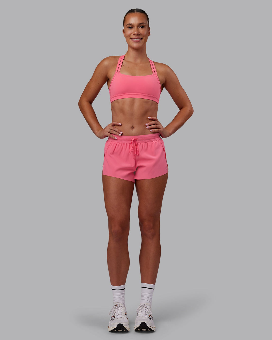 Woman wearing Accelerate 3" Running Short - Pink Lemonade | Model:Charlize | Size:S