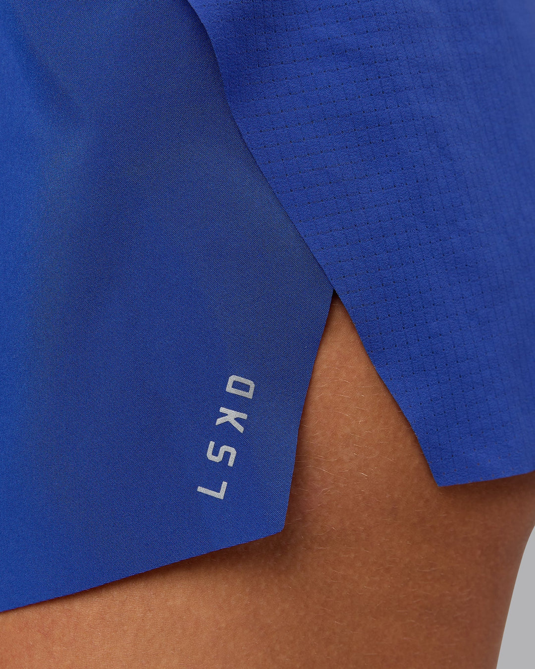 Woman wearing Accelerate 3" Run Short in Power Cobalt | Size:S