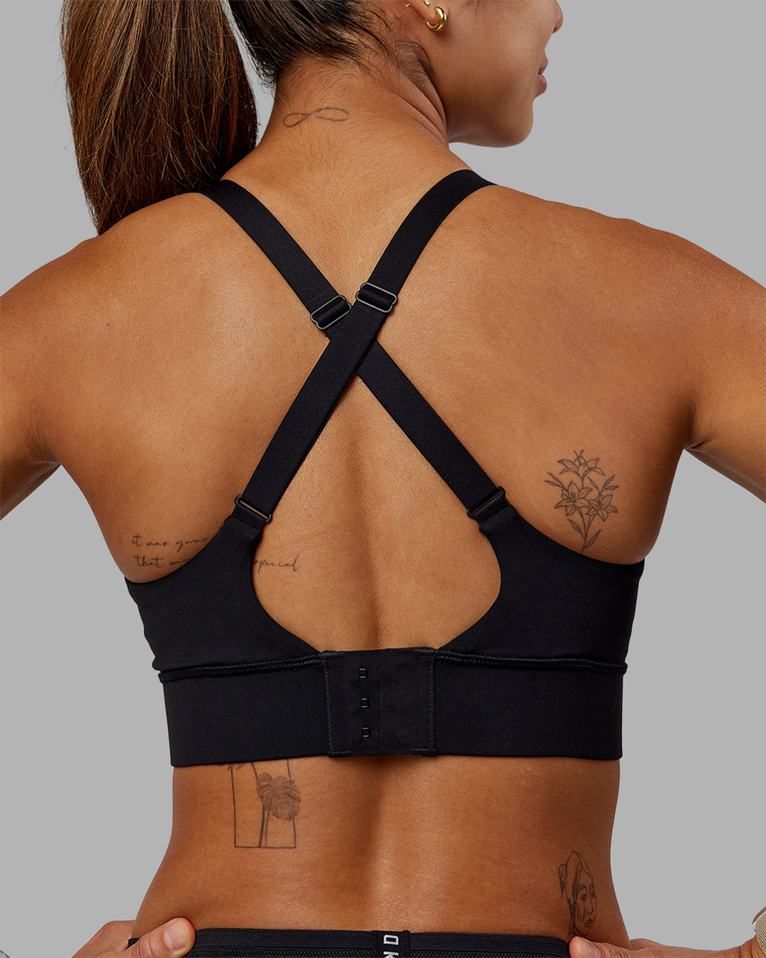 Woman wearing Accelerate Sports Bra - Black | Model:Vanessa | Size:S