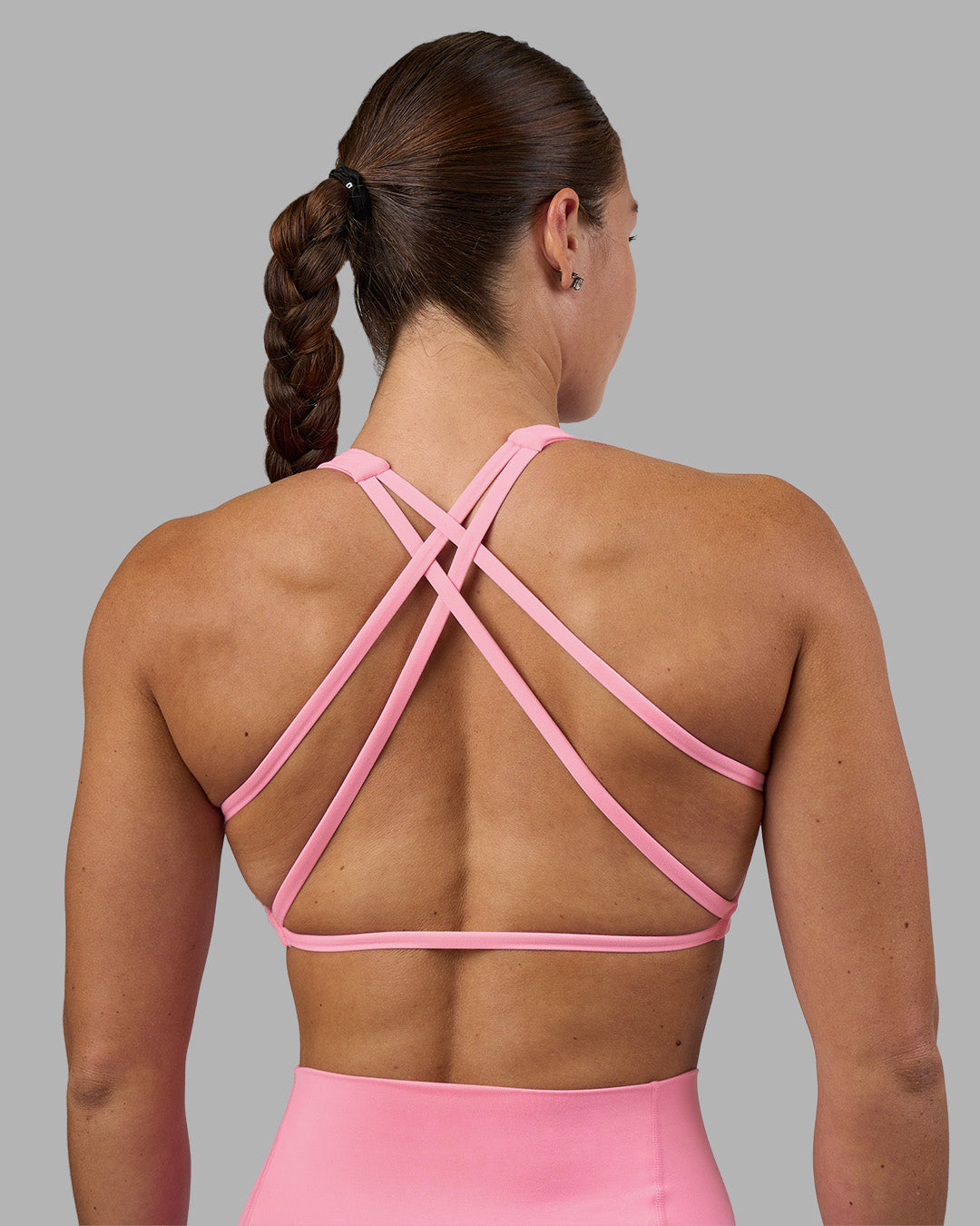 Woman wearing Aspire Sports Bra - Candy Pink | Model:Hannah | Size:S