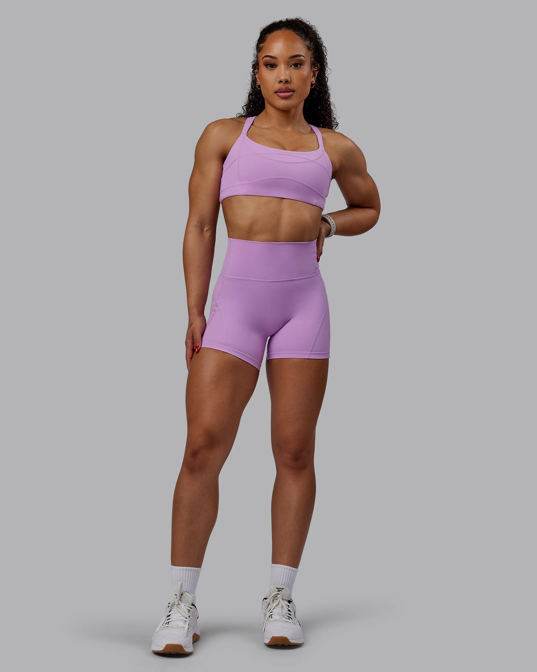 Woman wearing Bend Ultra High-Rise 4" Short - Light Violet