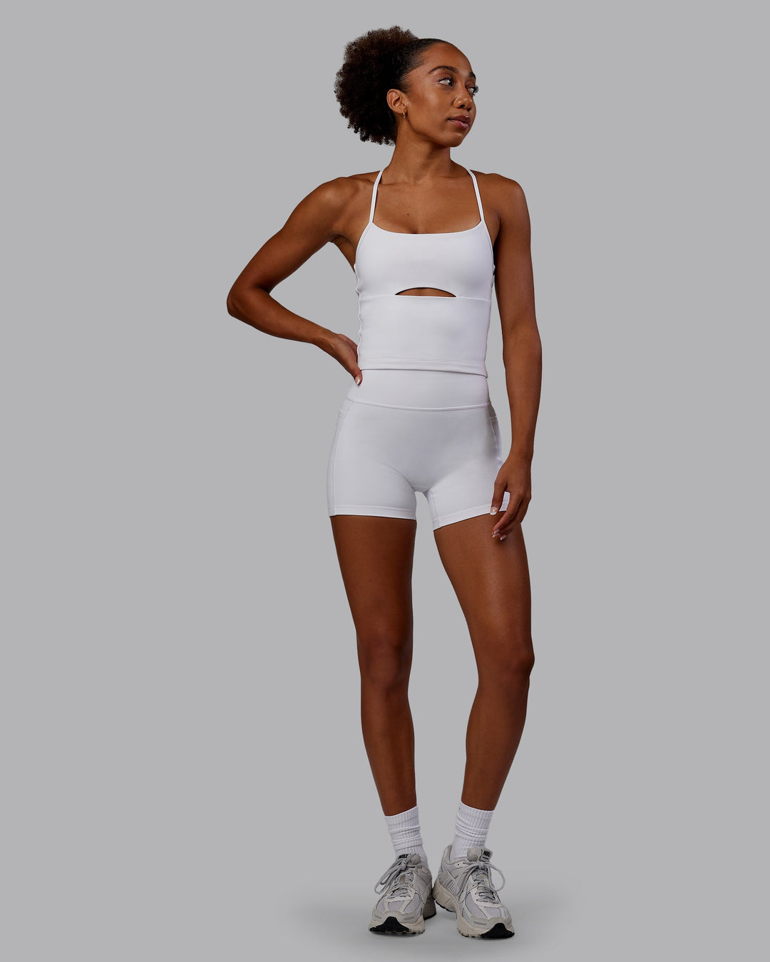Woman wearing Bree Masters Fusion Ultra High-Rise 4" Short Pockets - White