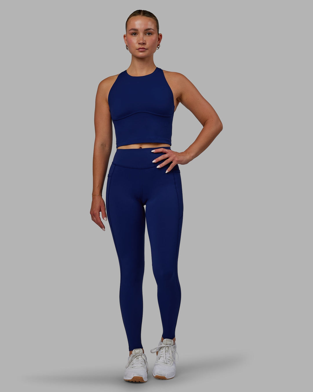 Woman wearing Elite High-Rise Full Length Legging Pockets - Midnight Blue