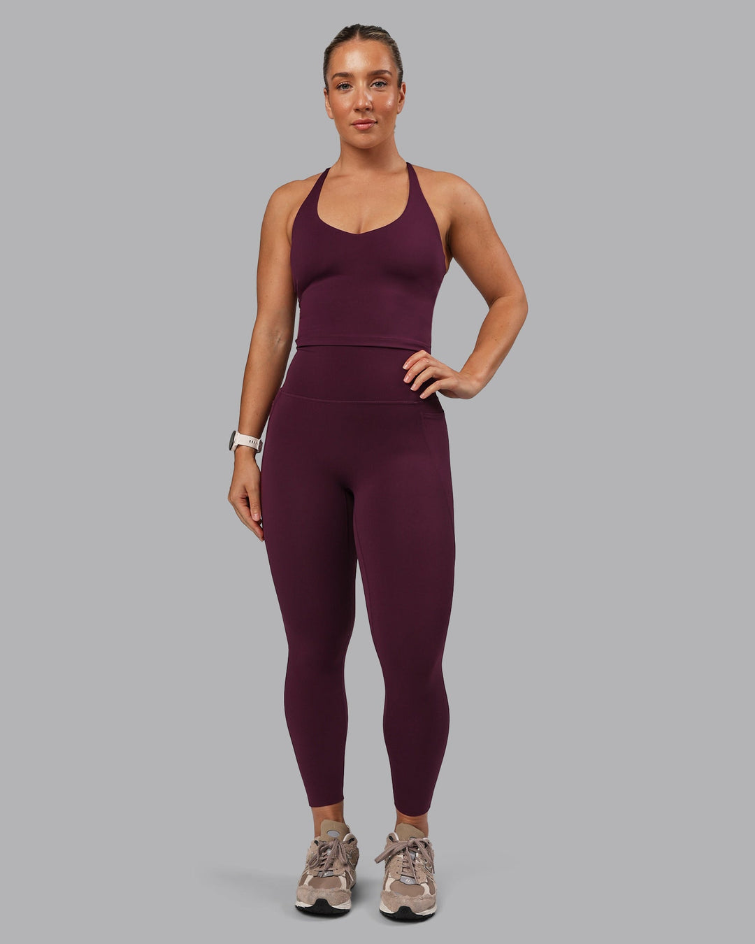 Woman wearing Elixir Ultra High-Rise 7/8 Legging Pockets - Cherry Lacquer