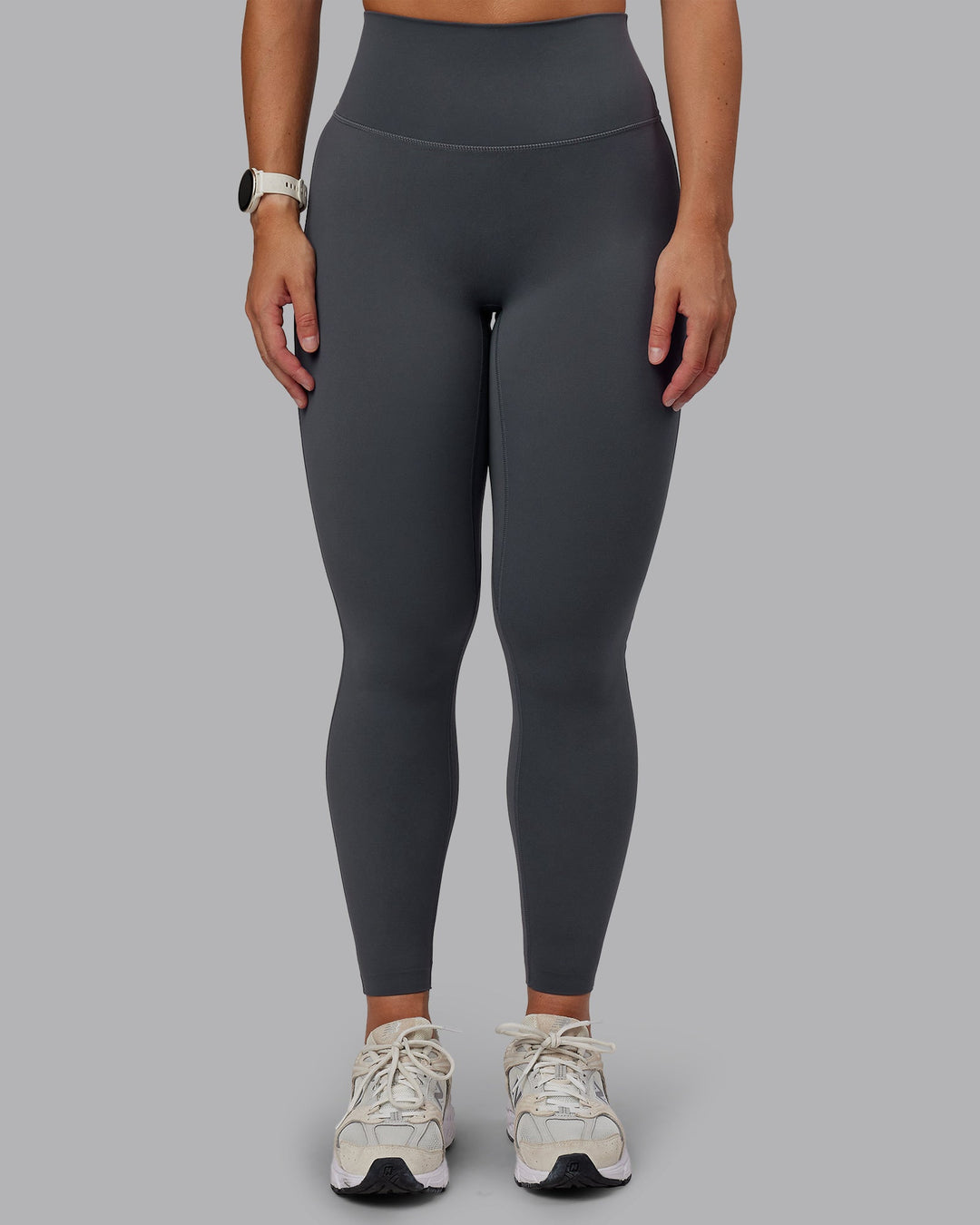 Woman wearing Elixir Ultra High-Rise Full Length Leggings in Dark Storm | Size:S