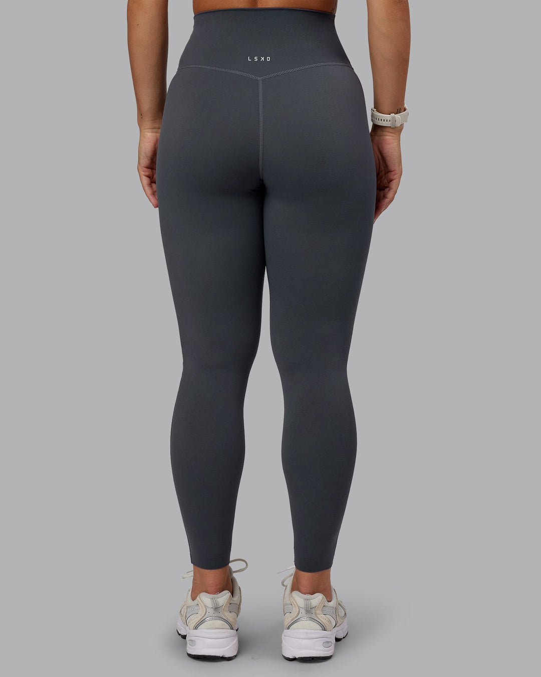Woman wearing Elixir Ultra High-Rise Full Length Leggings in Dark Storm | Size:S