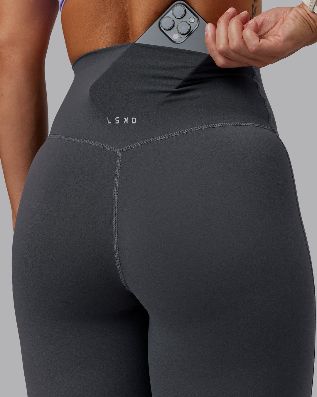 Woman wearing Elixir Ultra High-Rise Full Length Leggings in Dark Storm | Size:S