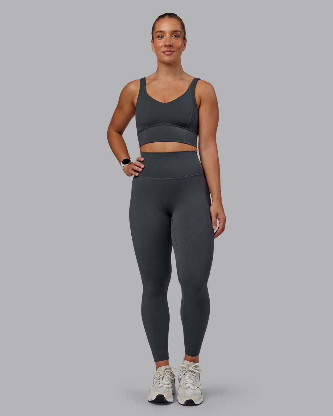 Woman wearing Elixir Ultra High-Rise Full Length Leggings in Dark Storm | Size:S