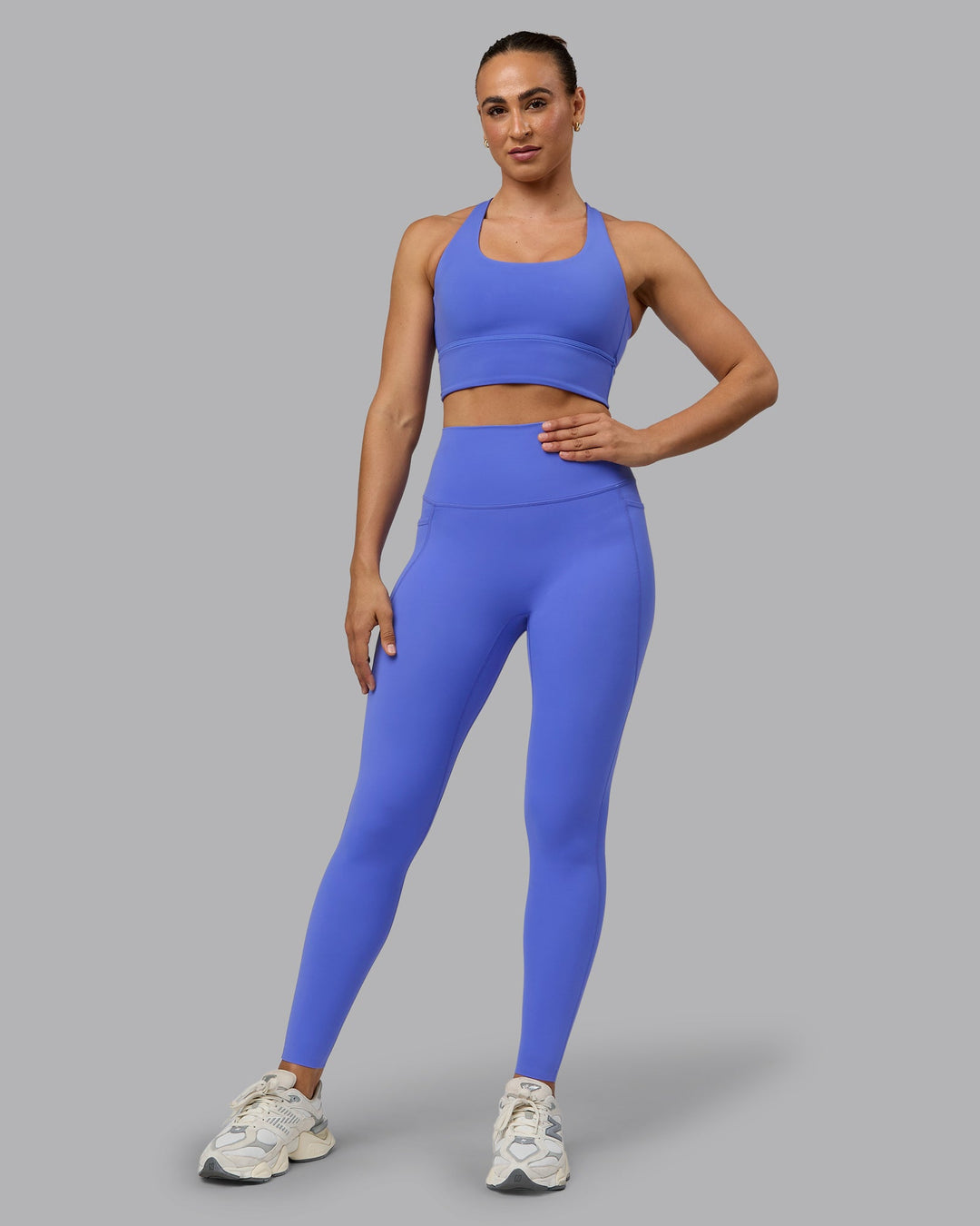 Woman wearing Elixir Ultra High-Rise Full Length Leggings Pockets - Baja Blue