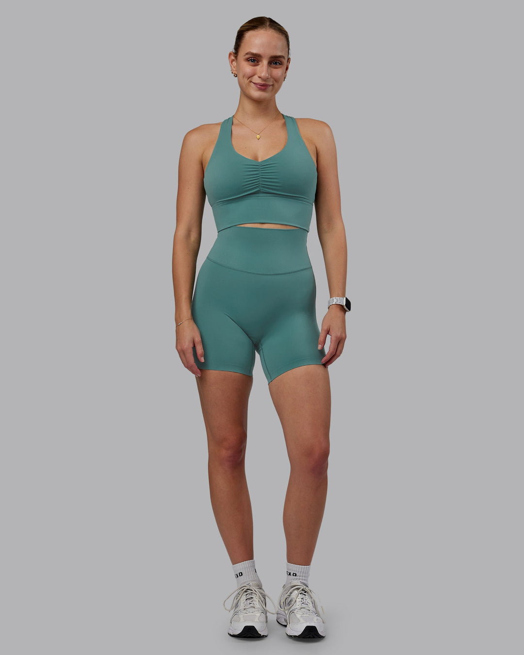 Woman wearing Elixir Ultra High-Rise 6" Short - Sagebrush