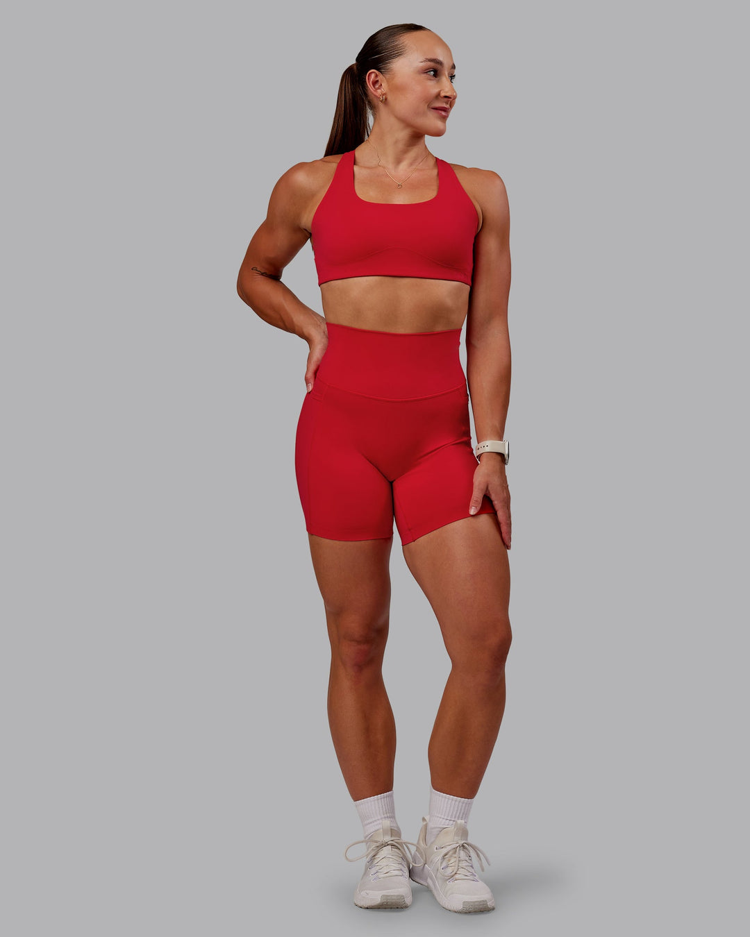 Woman wearing Elixir Ultra High-Rise 6" Short Pockets in Flame | Size:S