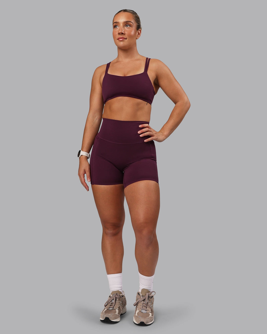 Woman wearing Elixir Ultra High-Rise 6" Short Pockets - Cherry Lacquer