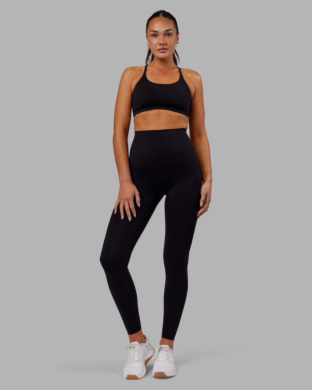 Woman wearing Elixir Ultra High-Rise Full Length Legging - Black | Model:Kirstyn | Size:S