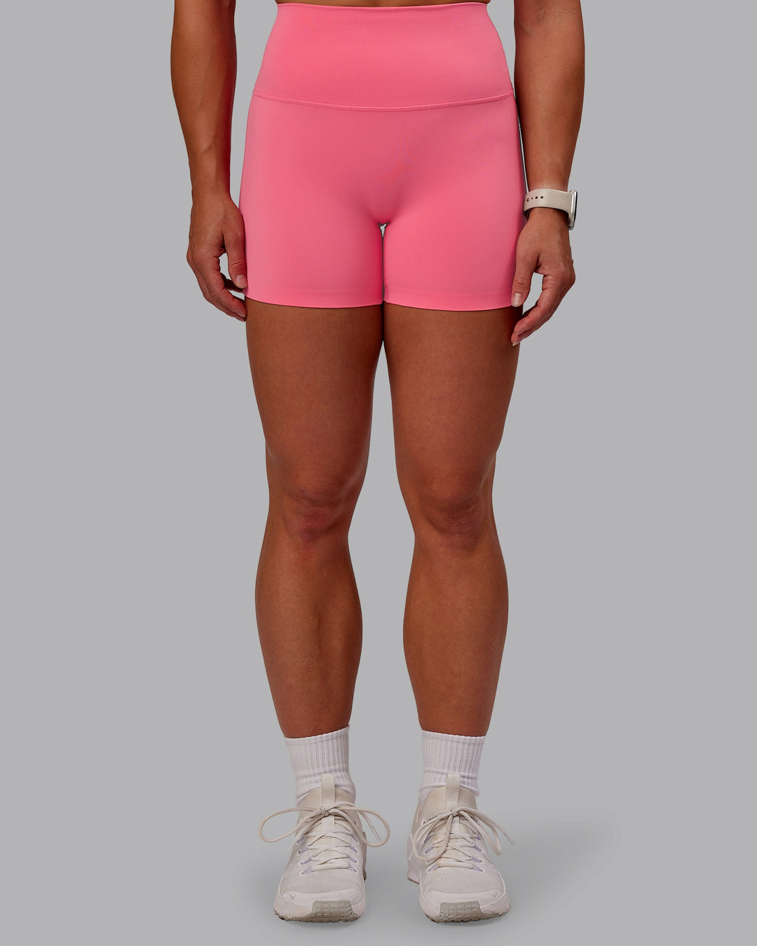 Woman wearing Elixir Ultra High-Rise 4" Short in Pink Lemonade | Size:S