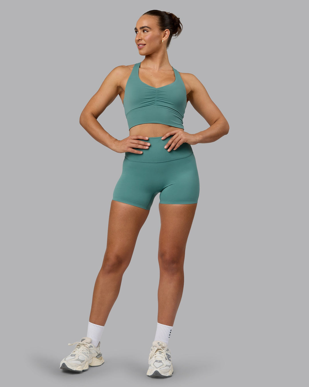 Woman wearing Elixir Ultra High-Rise 4" Short - Sagebrush