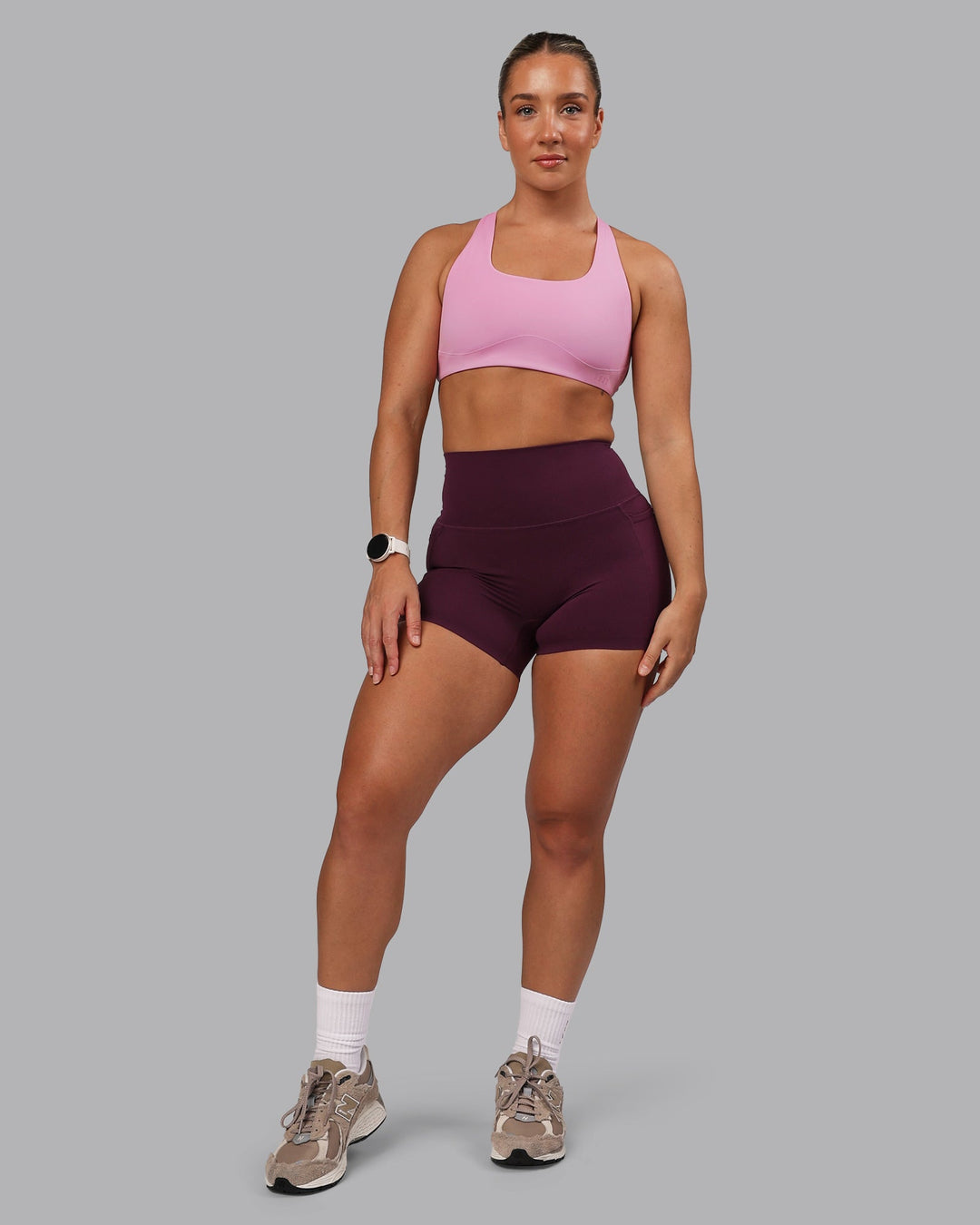 Woman wearing Elixir Ultra High-Rise 4" Short Pockets - Cherry Lacquer