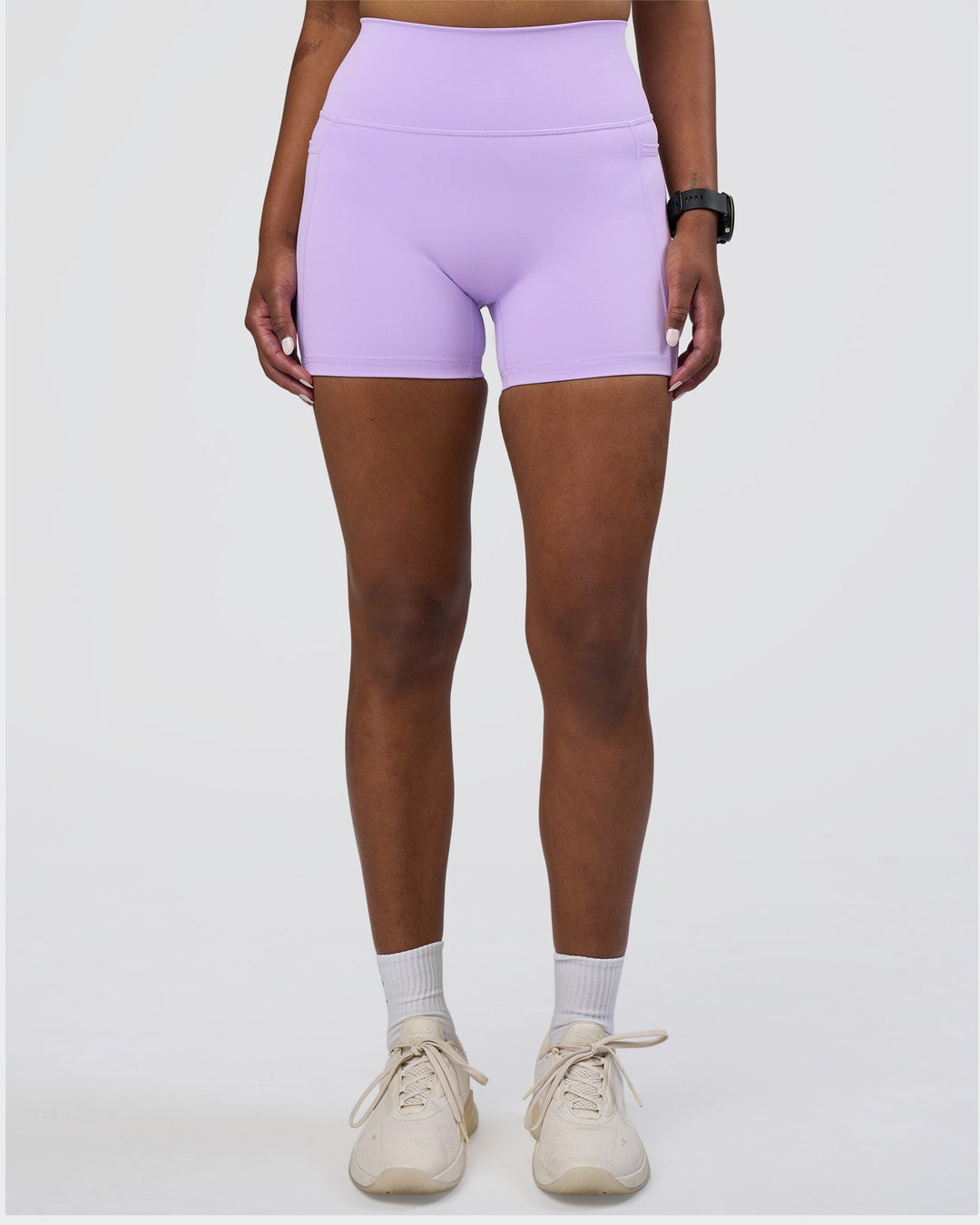 Woman wearing Fusion Ultra High-Rise 4" Short Pockets - Pale Lilac | Model:Rica | Size:S