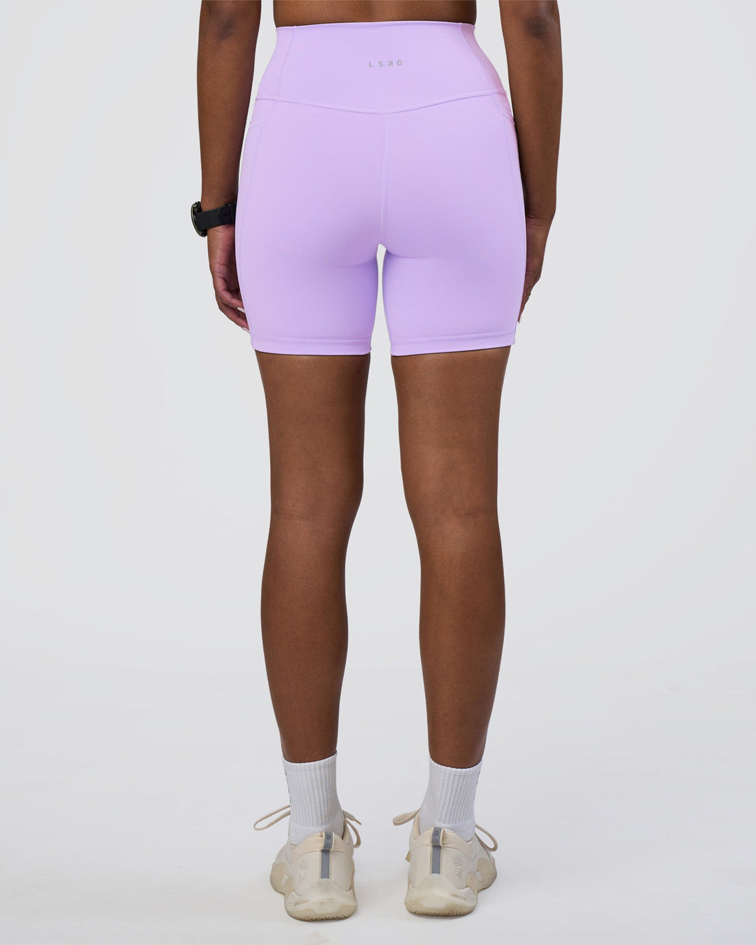 Woman wearing Fusion Ultra High-Rise 6" Short Pockets - Pale Lilac | Model:Rica | Size:S