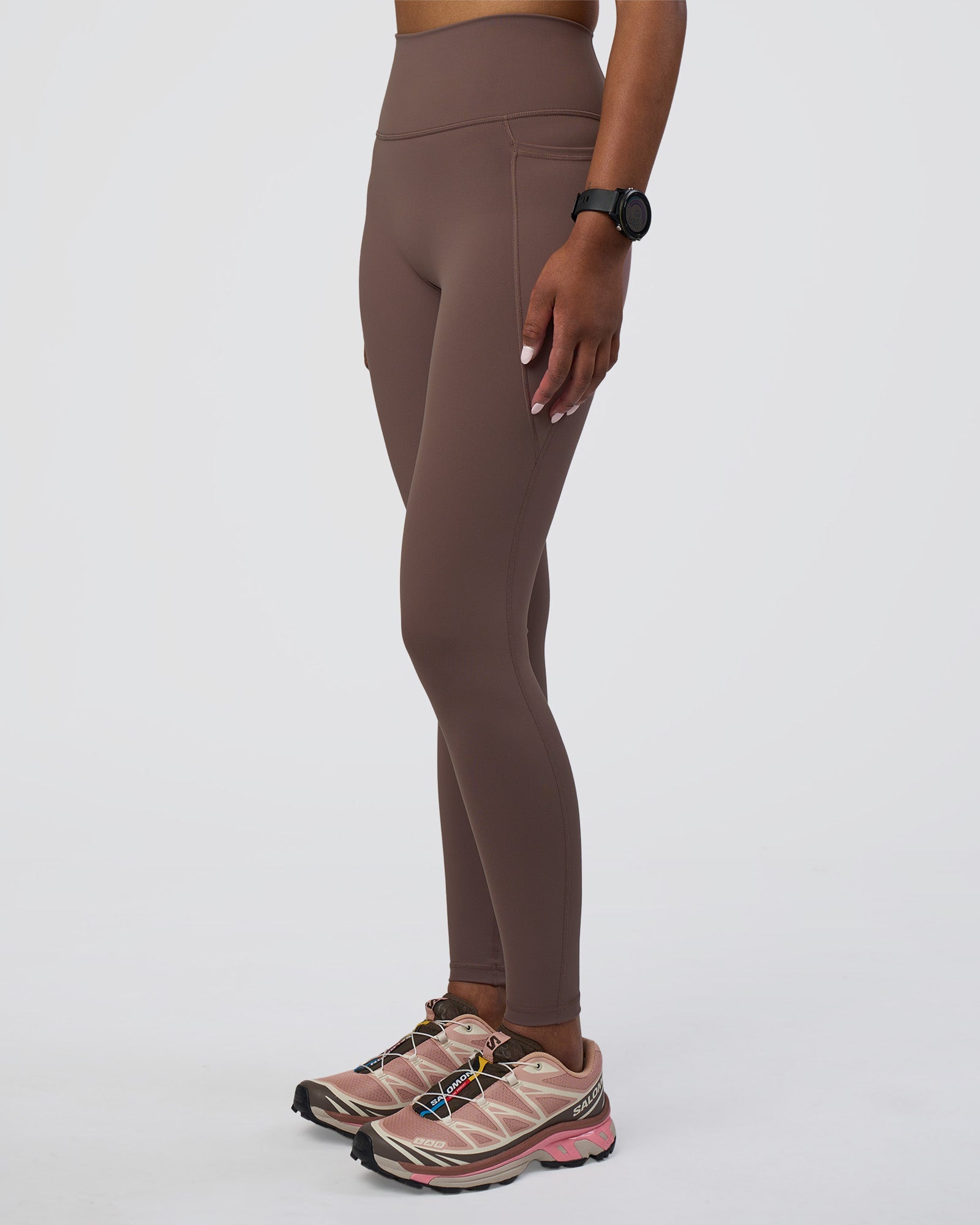 Woman wearing Fusion Ultra High-Rise Full Length Legging Pockets - Peppercorn | Model:Rica | Size:S