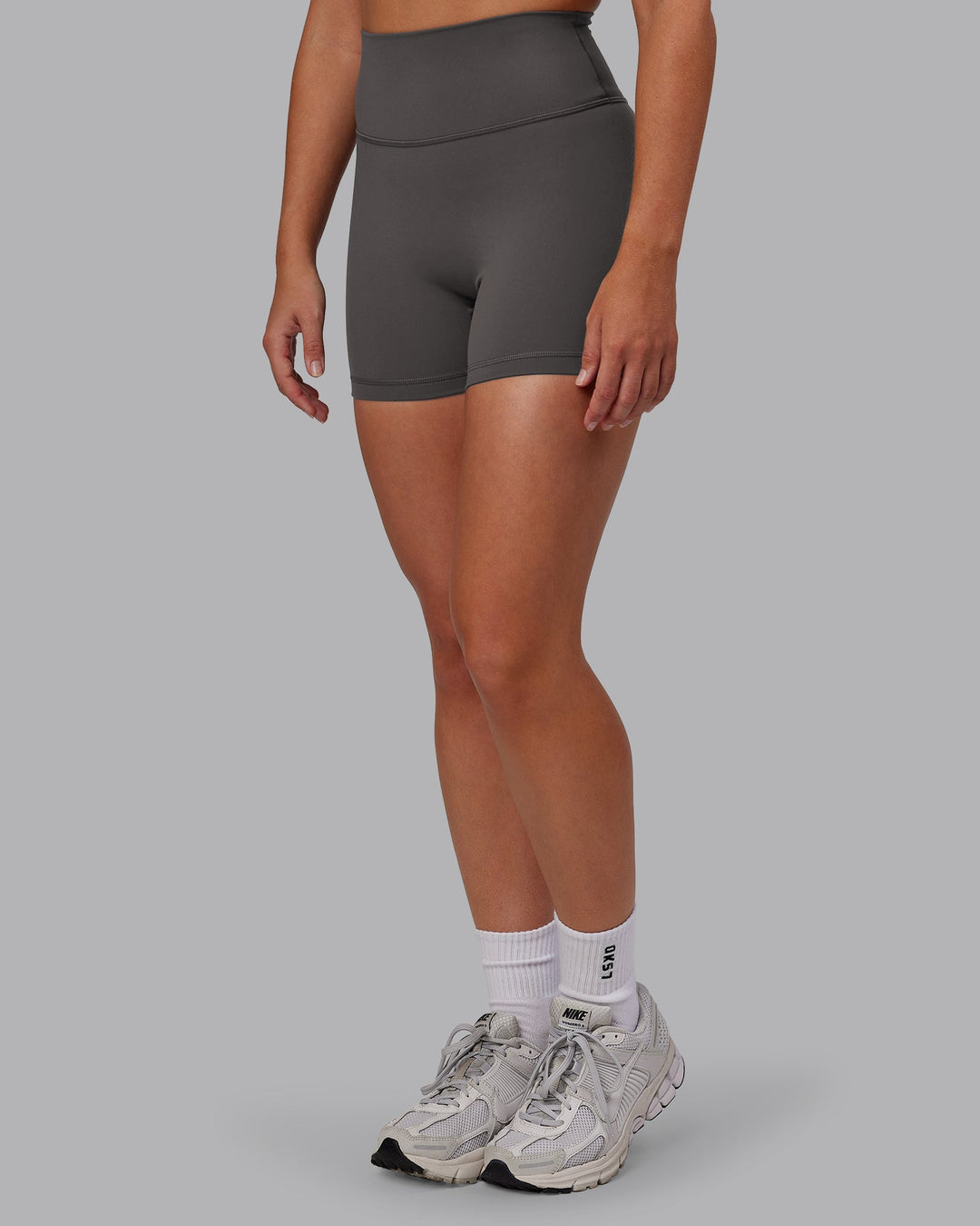 Woman wearing Fusion Ultra High-Rise 4" Short - Dark Storm | Model:Hannah | Size:S