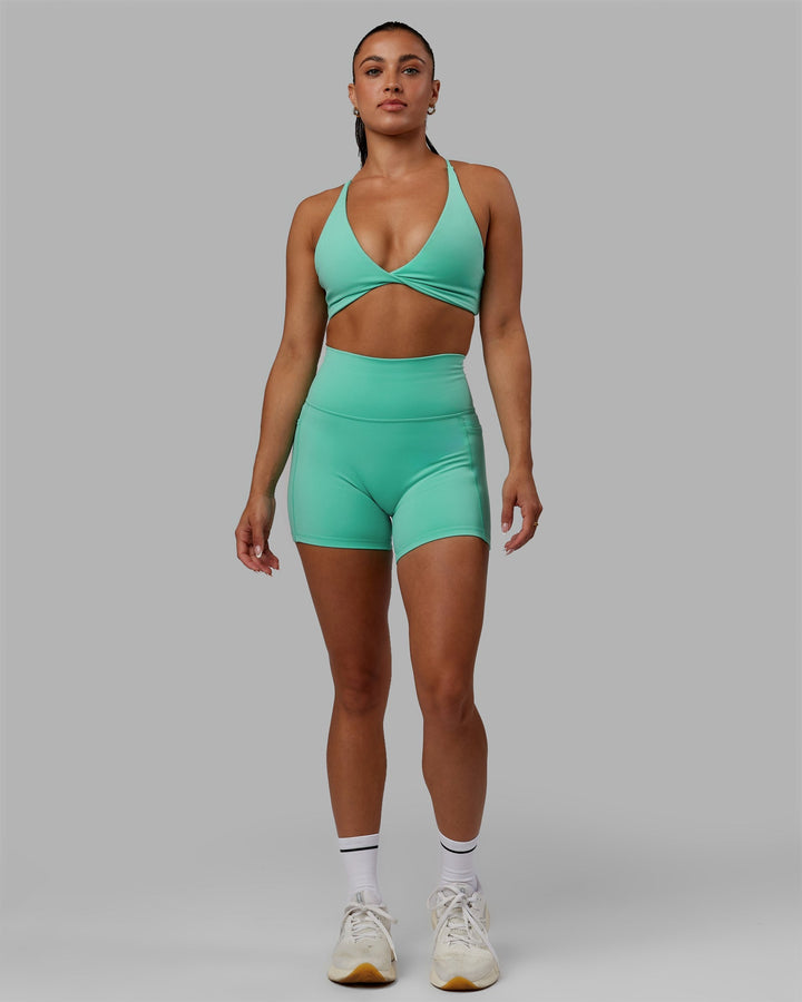 Woman wearing Fusion X-Length Shorts - Aquatic Awe