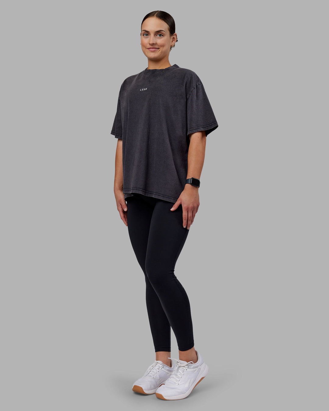 Woman wearing Go-To FLXCotton Oversized Tee - Black Washed-White | Model:Keisha | Size:S