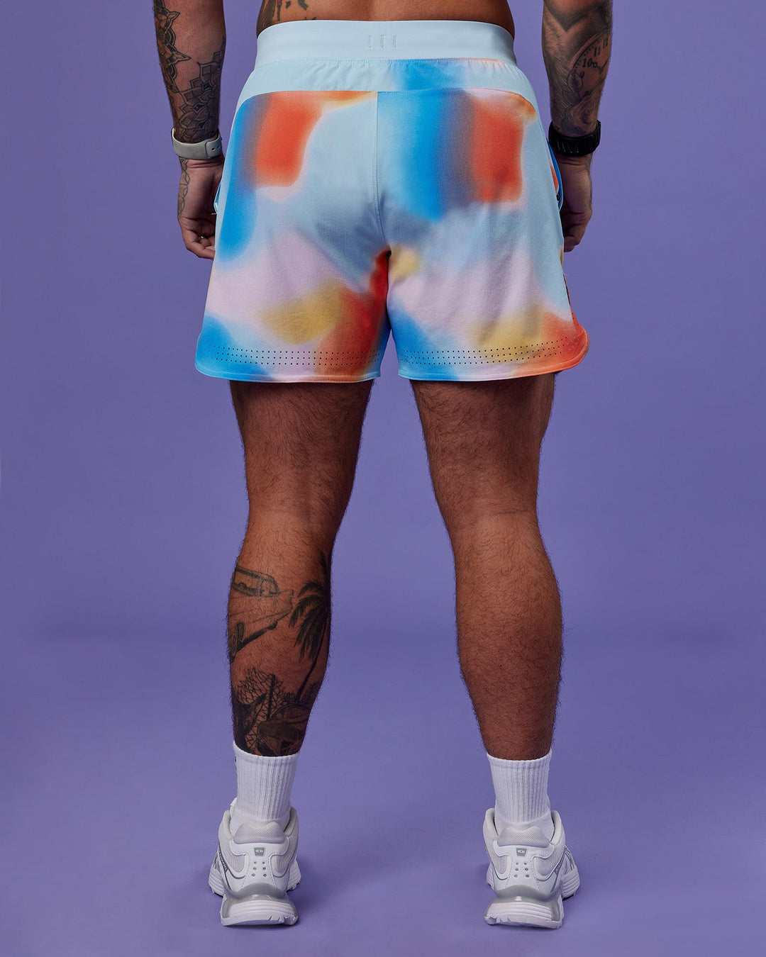 Model wearing Lift 6" Short - Rainbow Shade Print | Model:Tayden | Size:S