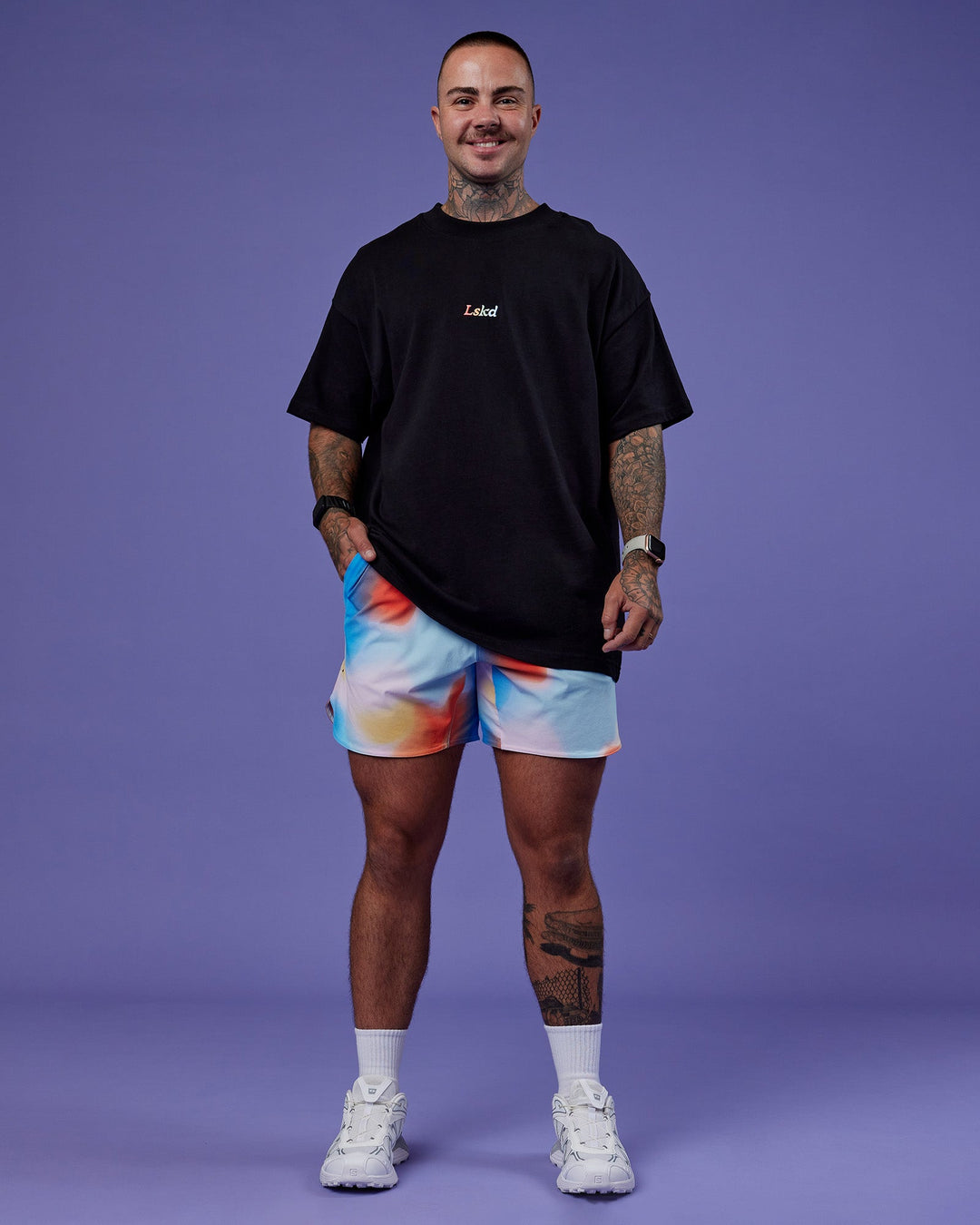 Model wearing Lift 6" Short - Rainbow Shade Print | Model:Tayden | Size:S