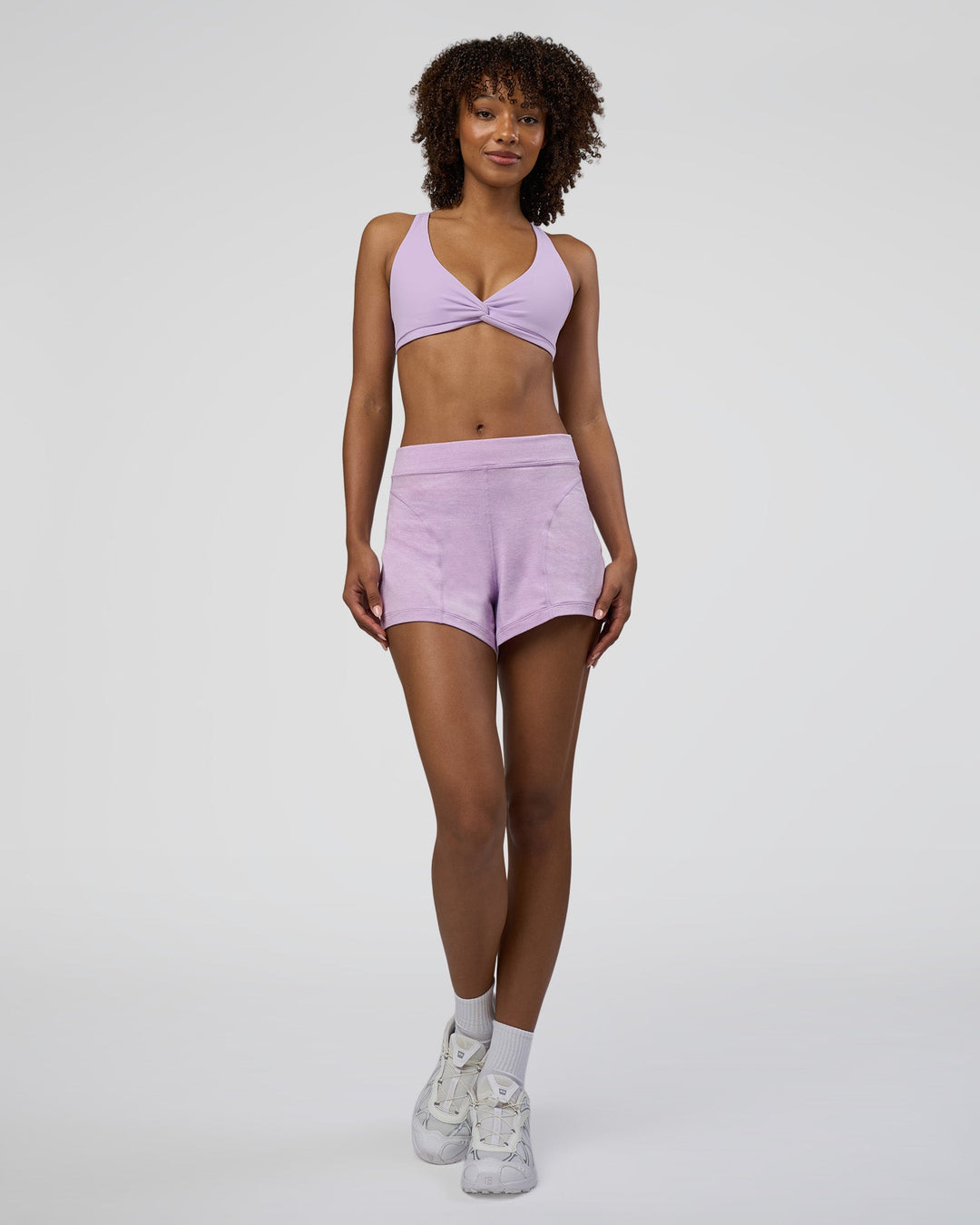 Woman wearing Movement CloudFLX 3" Short - Orchid Bloom Marl | Model:Tomi | Size:S