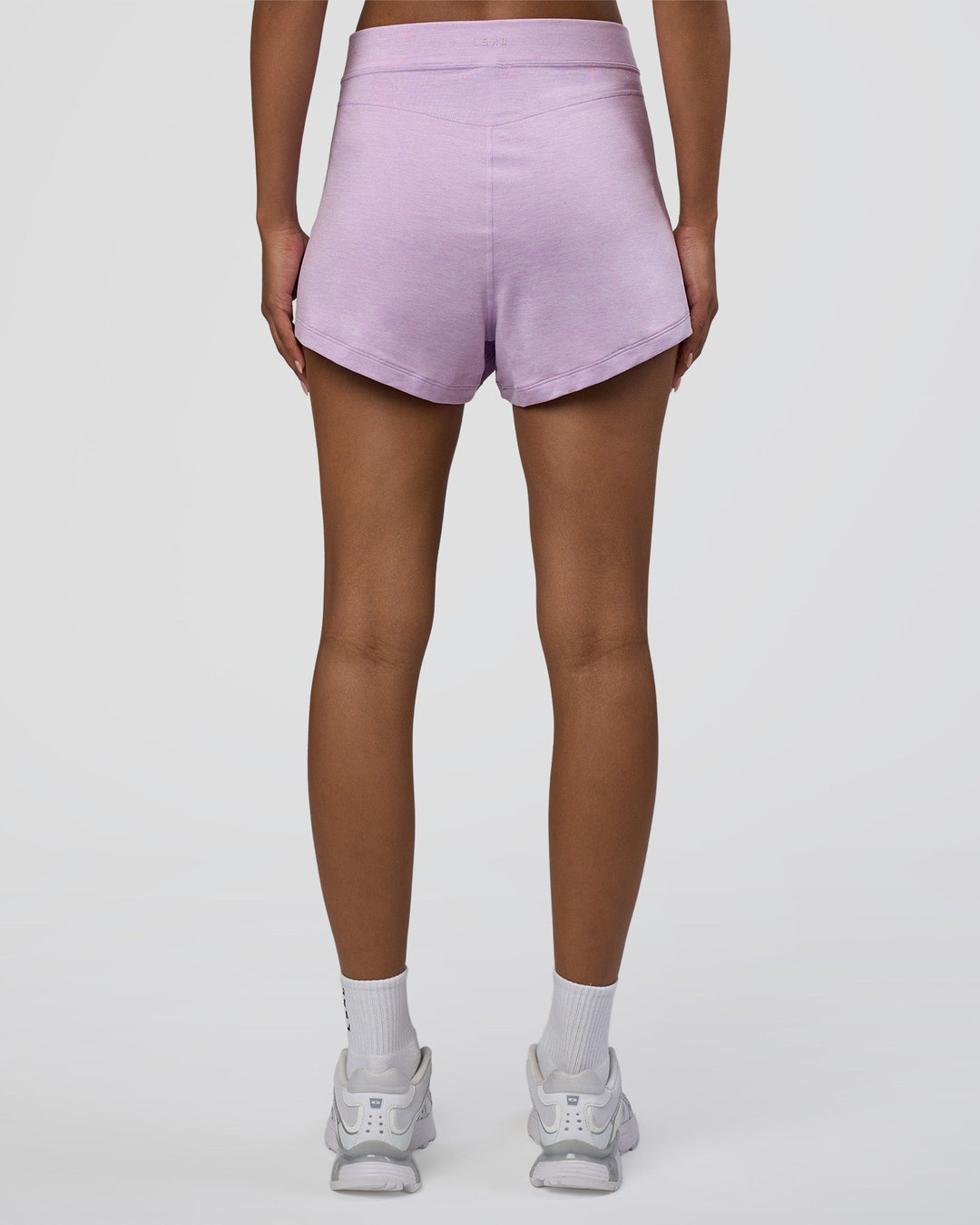 Woman wearing Movement CloudFLX 3" Short - Orchid Bloom Marl | Model:Tomi | Size:S