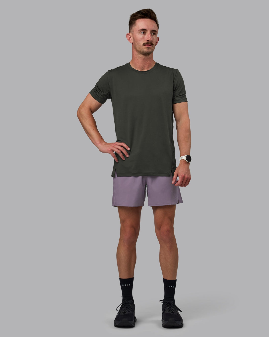 Man wearing Pace 5" Lined Performance Shorts - Purple Sage