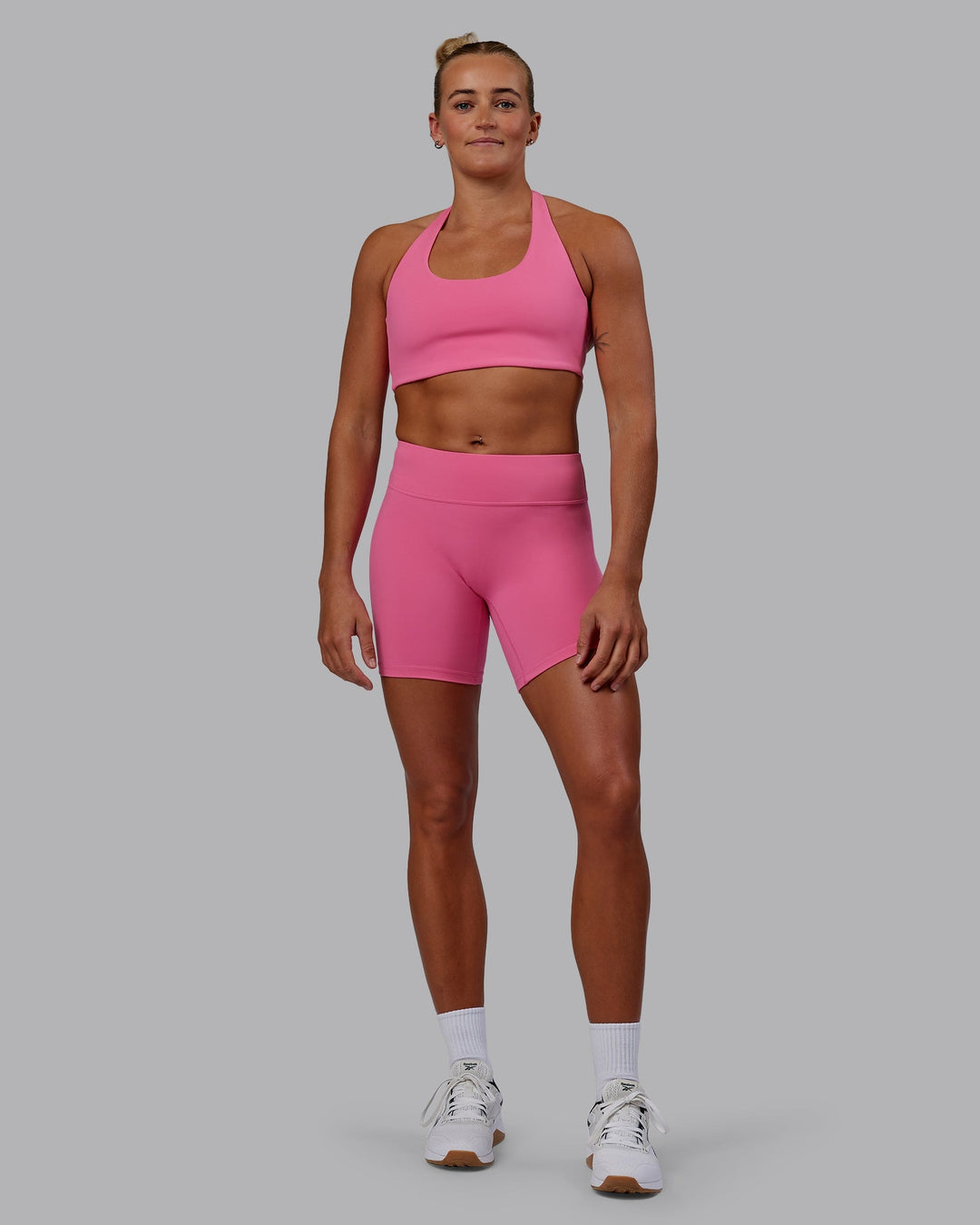 Woman wearing RXD Low-Rise 6" Short - Carmine Rose