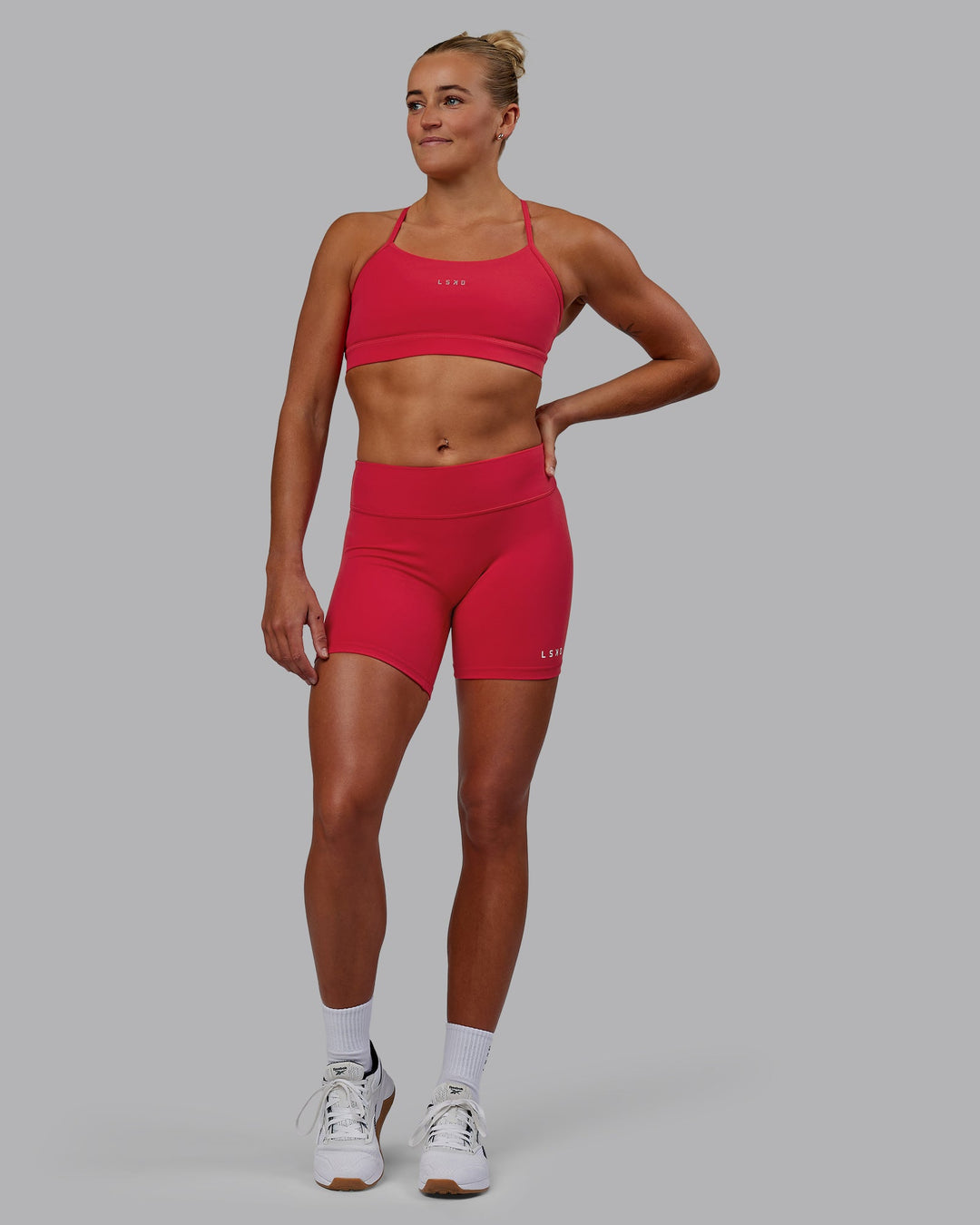 Woman wearing RXD Low-Rise 6" Short - Scarlet