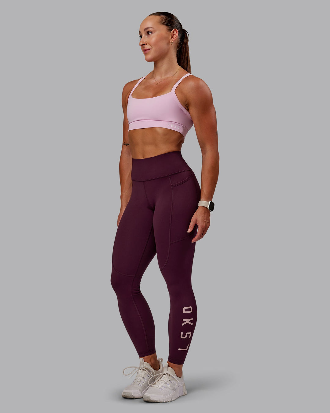 Woman wearing Rep Ultra High-Rise 7/8 Leggings Pockets - Cherry Lacquer-Marshmallow