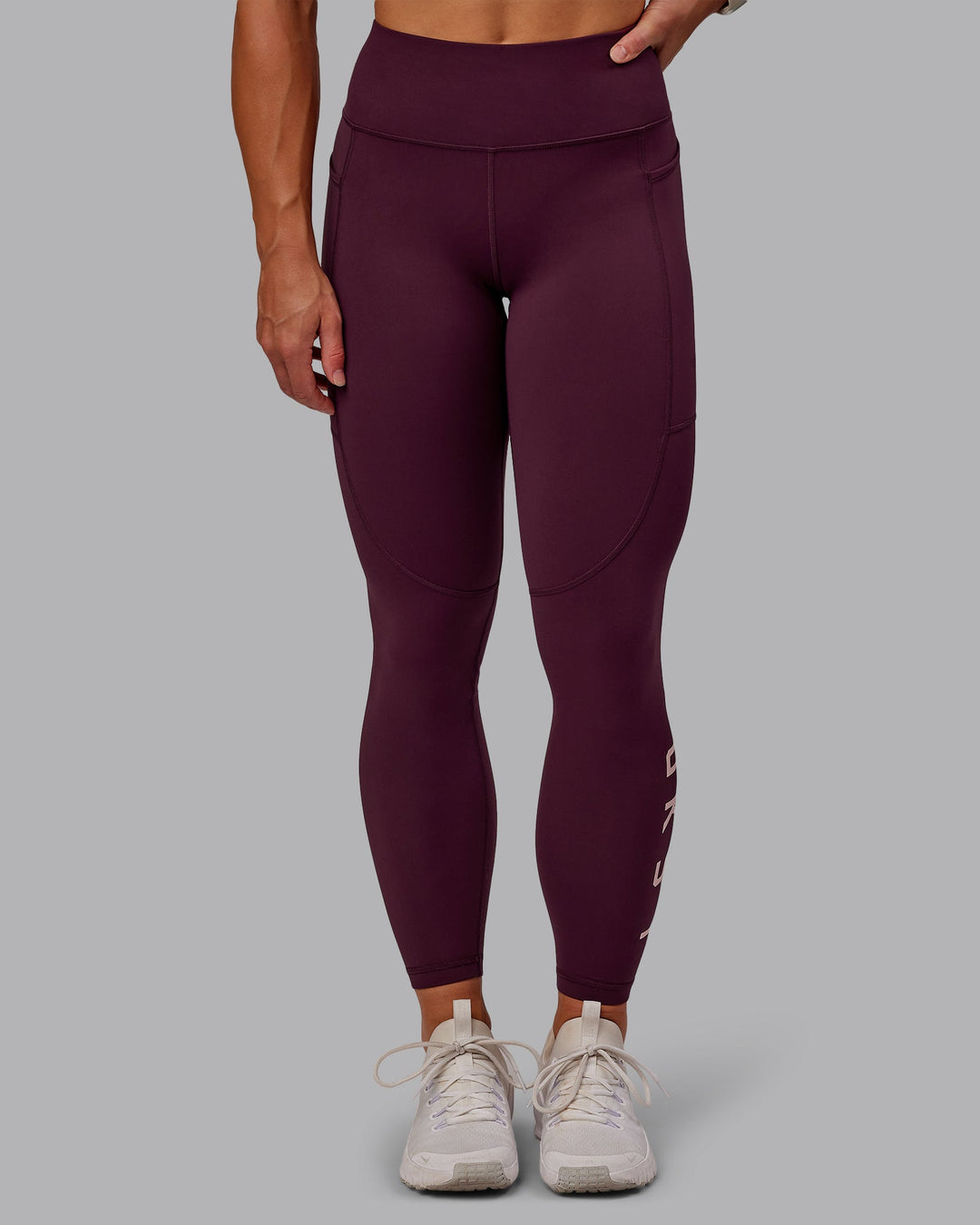 Woman wearing Rep Ultra High-Rise 7/8 Leggings Pockets - Cherry Lacquer-Marshmallow