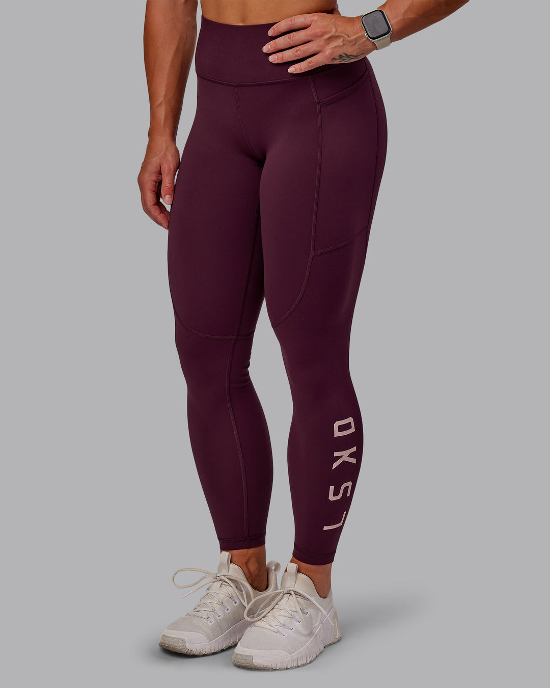 Woman wearing Rep Ultra High-Rise 7/8 Leggings Pockets - Cherry Lacquer-Marshmallow