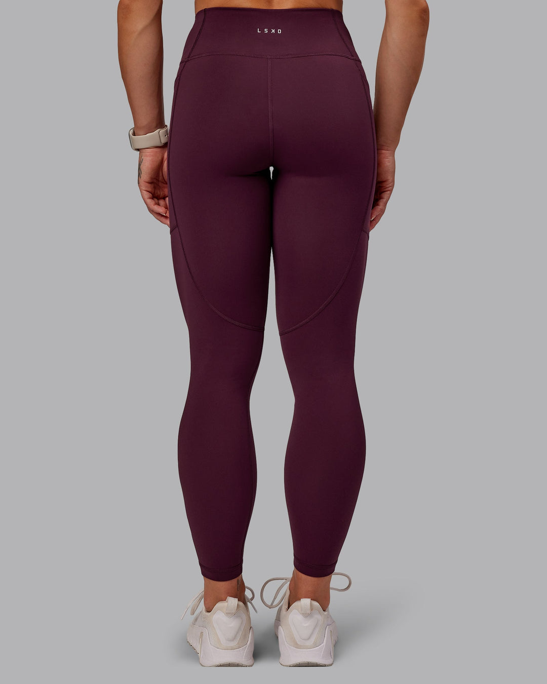 Woman wearing Rep Ultra High-Rise 7/8 Leggings Pockets - Cherry Lacquer-Marshmallow