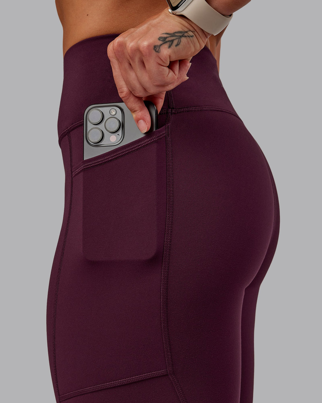 Woman wearing Rep Ultra High-Rise 7/8 Leggings Pockets - Cherry Lacquer-Marshmallow